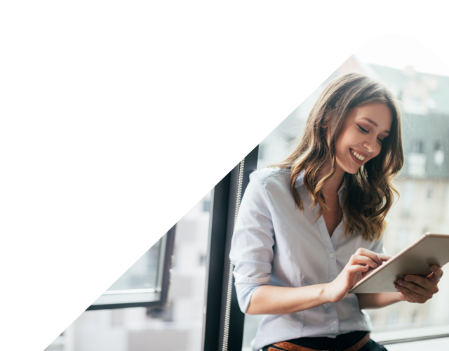 Lenvi Newsletter image of woman on a tablet by window