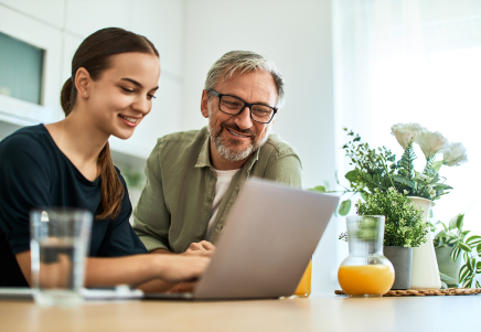 Parent helping child with finances